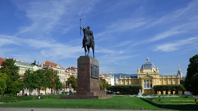 Expat in Croatia walking in a city with backpack, Croatian skyline in background